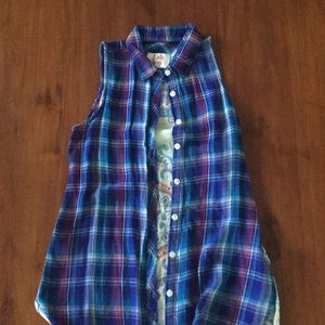 Sleeveless blue button down shirt
